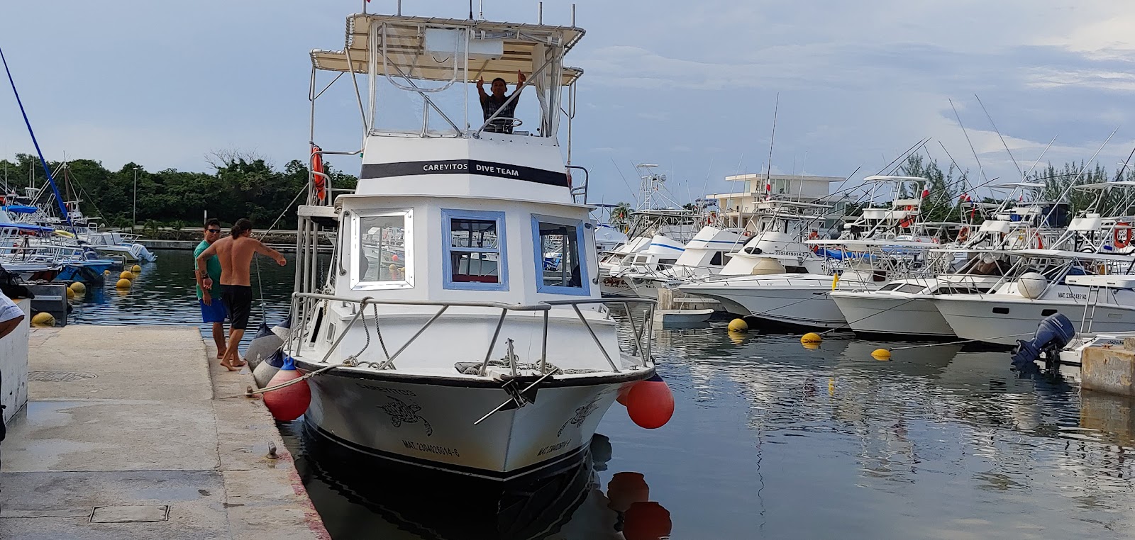 The Careyitos Divers boat tied up at the marina dock in Cozumel